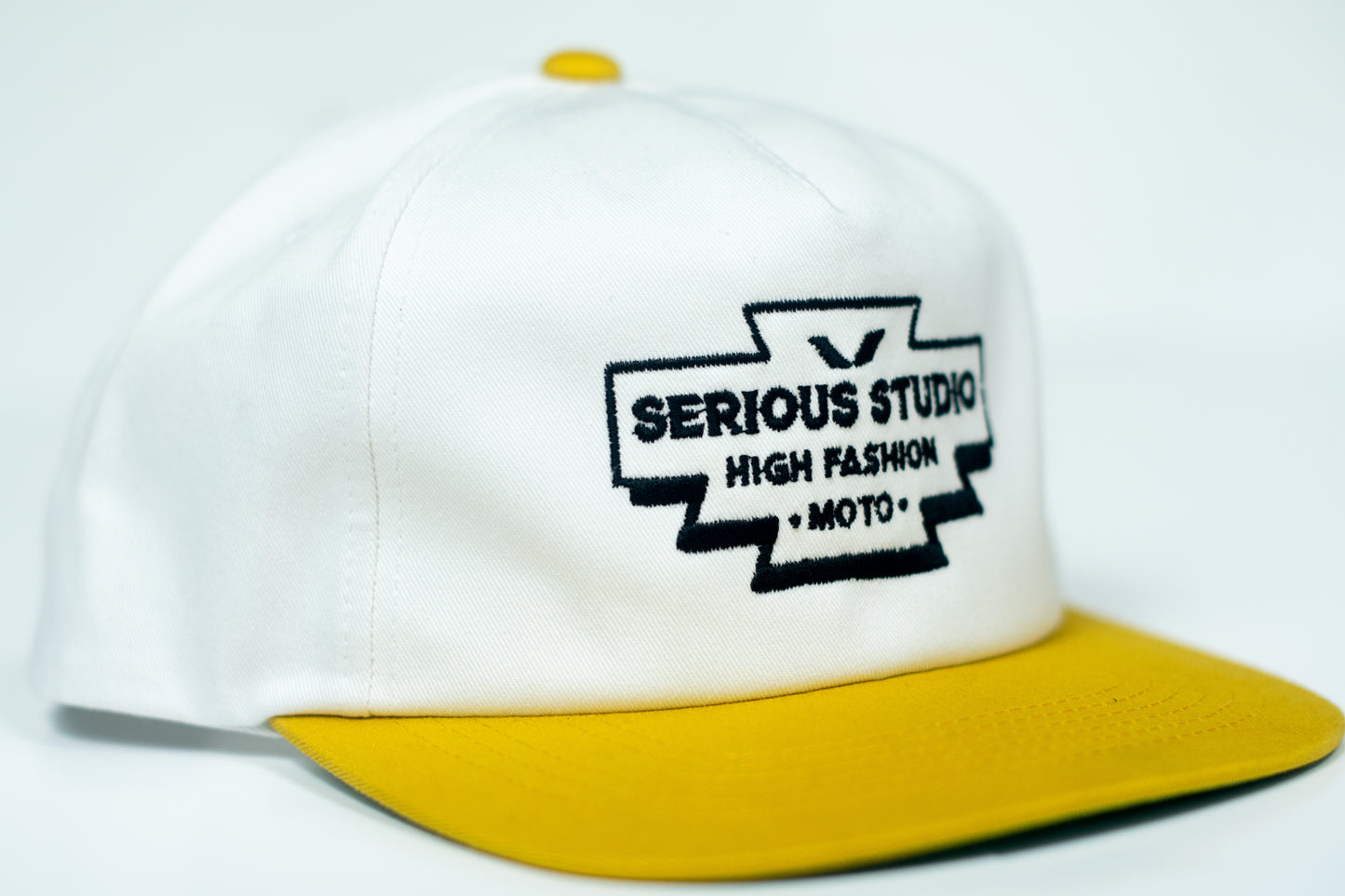 SERIOUS STUDIO HIGH FASHION SNAPBACK HAT