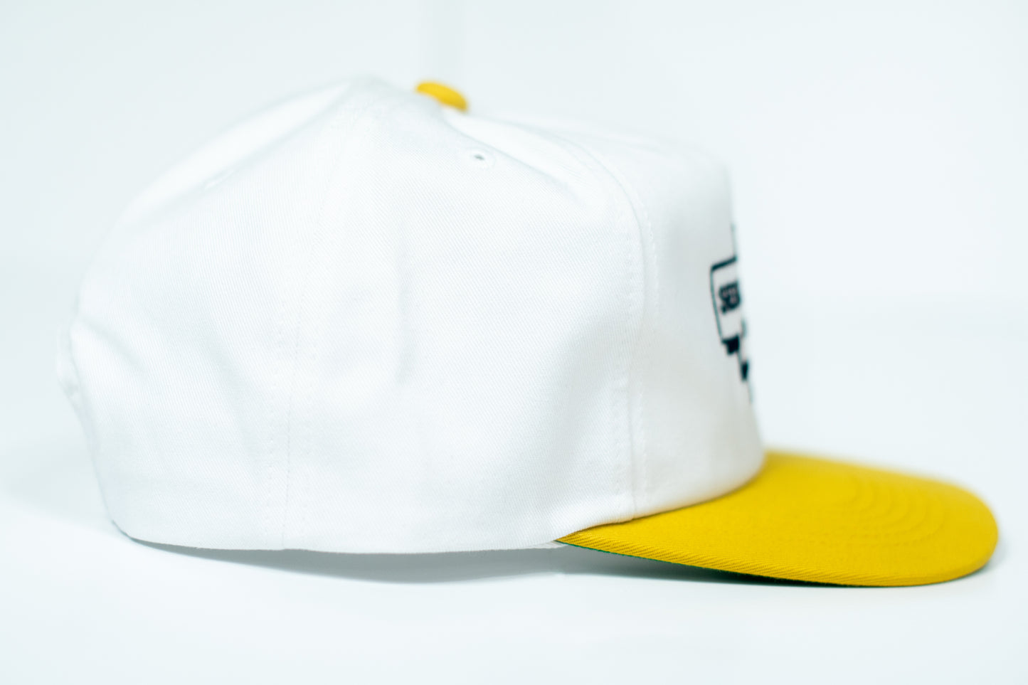 SERIOUS STUDIO HIGH FASHION SNAPBACK HAT