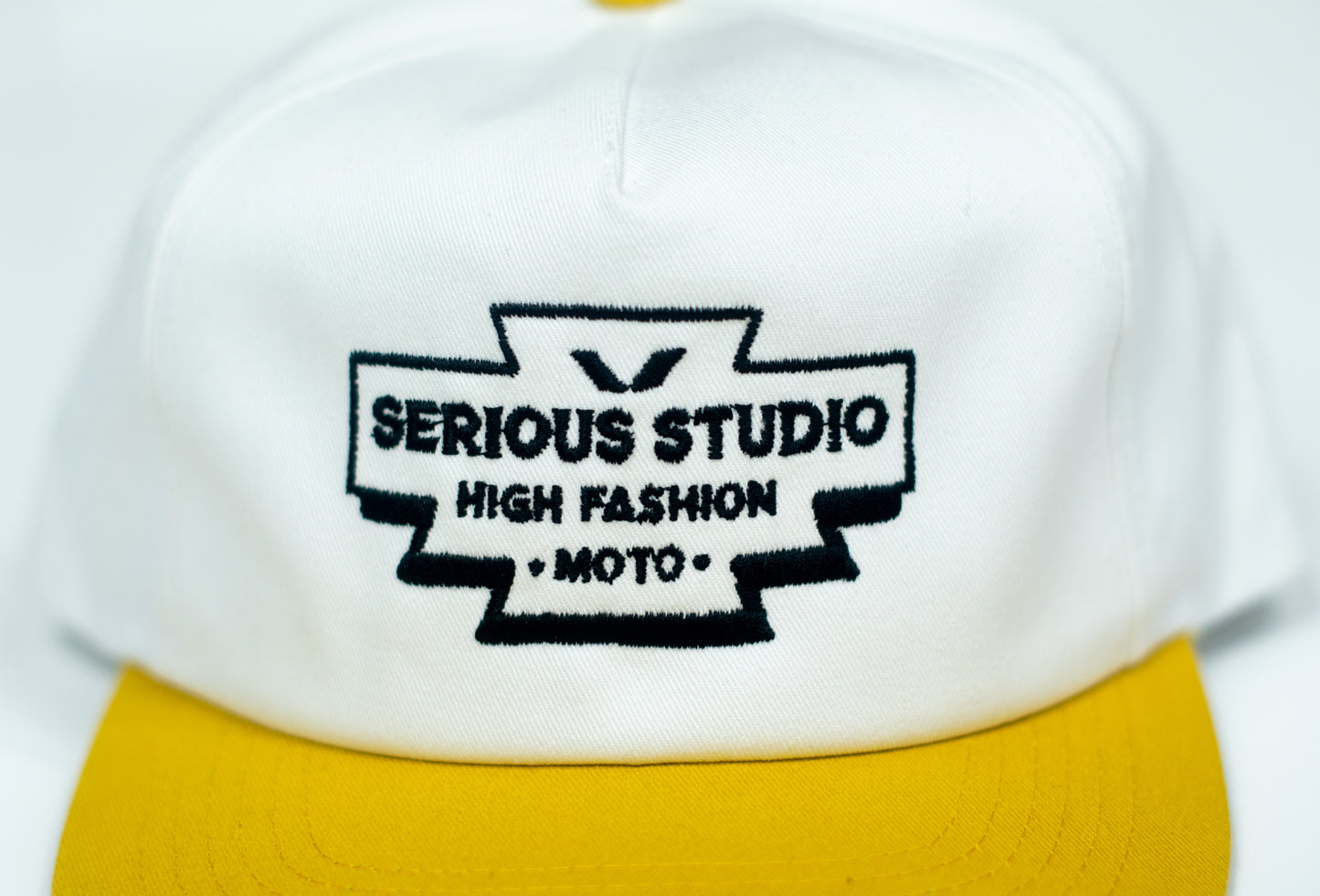 SERIOUS STUDIO HIGH FASHION SNAPBACK HAT