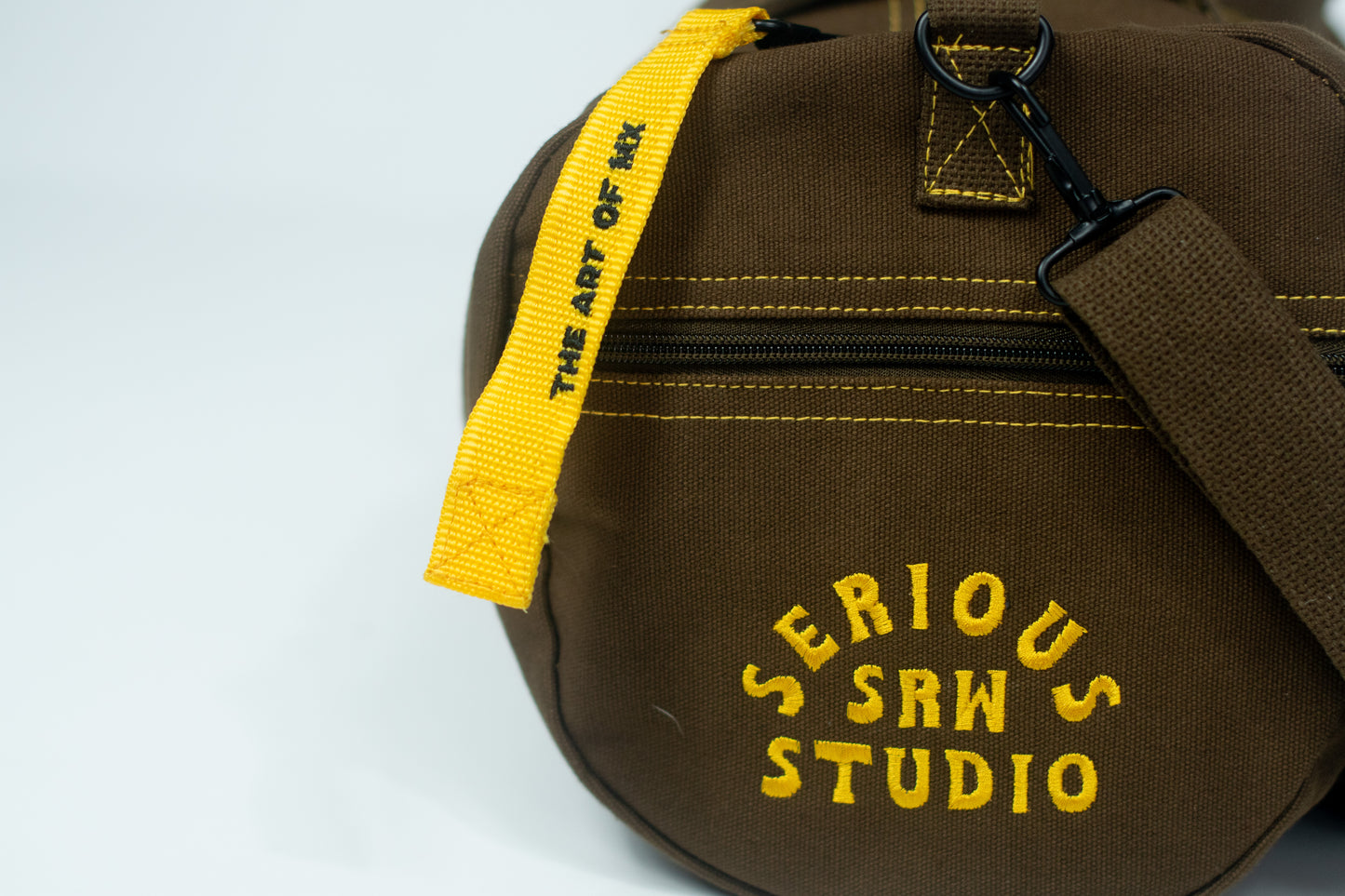 SERIOUS STUDIO ICONIC DUFFLE BAG - BROWN / GOLD